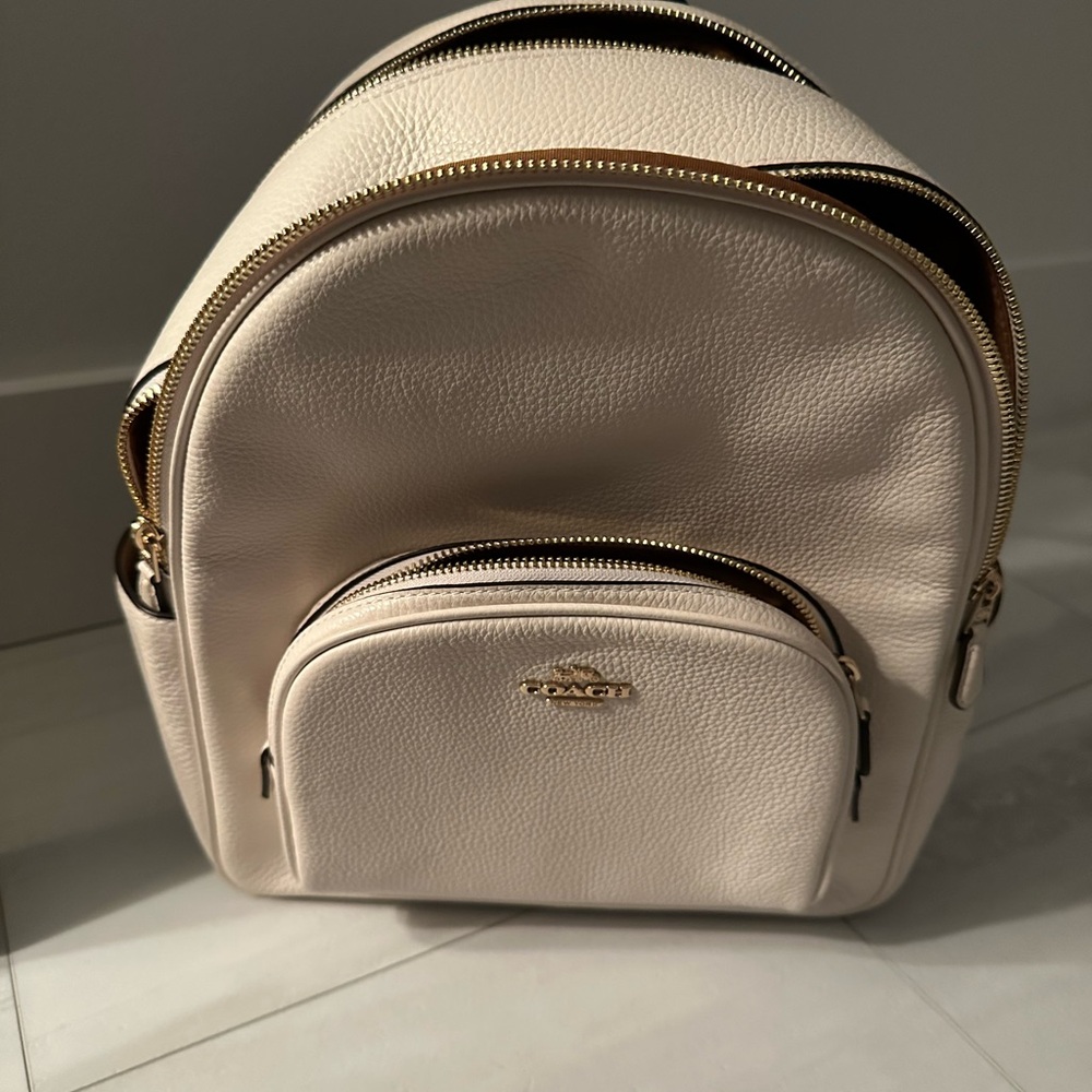 Coach ivory leather women’s backpack